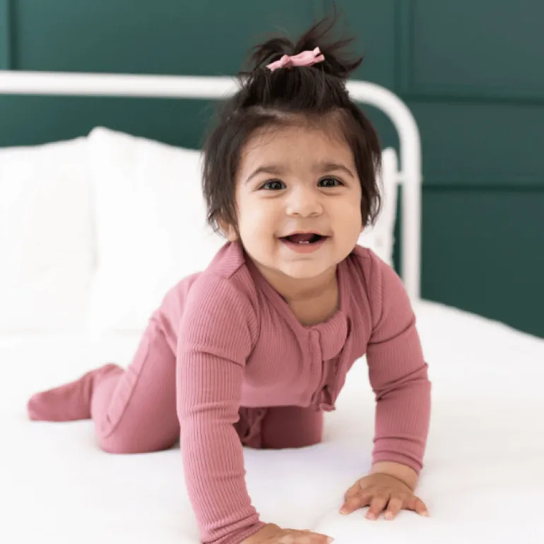 Kyte Baby Ribbed Ruffle Zippered Footie